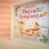 Quadro de Nascimento Uma Família de Suricatas - Nuvens e letras rosa