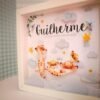 Quadro de Nascimento Uma Família de Suricatas - Nuvens e letras verde